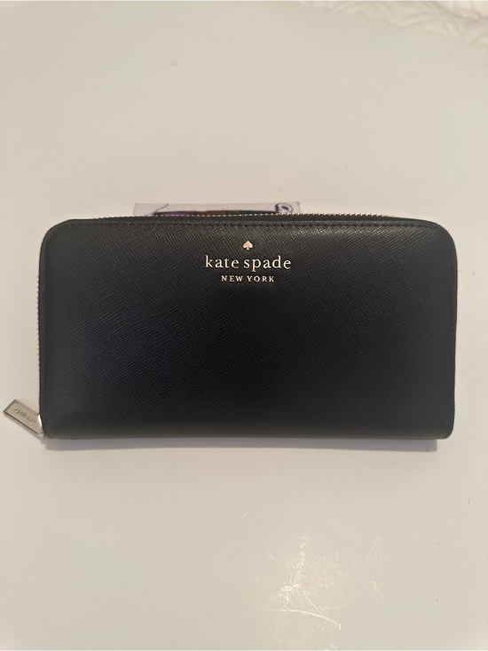 kate spade Handbags - kate spade black saffiano zip-around wallet with gold logo